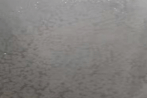 defoamer 1 Comparison of self-leveling mortar surface: pinholes vs bubble-free surface using INVINO powder defoamer